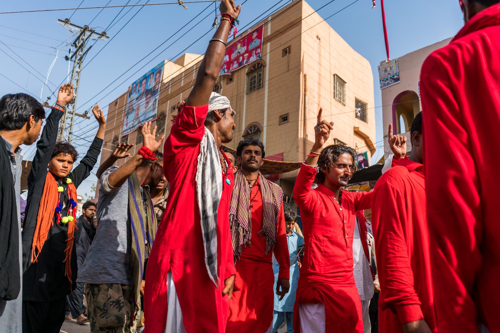 The Urs of Lal Shahbaz Qalandar in Sehwan, Pakistan - Sufi men in red dancing on the streets - Lost With Purpose travel blog